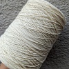 Пряжа в бобинах Merinos цвет 599 молочный. Цена указана за 10гр
